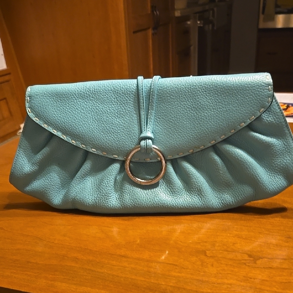 Elegant Blue Clutch with Gathered Design and Metal Ring